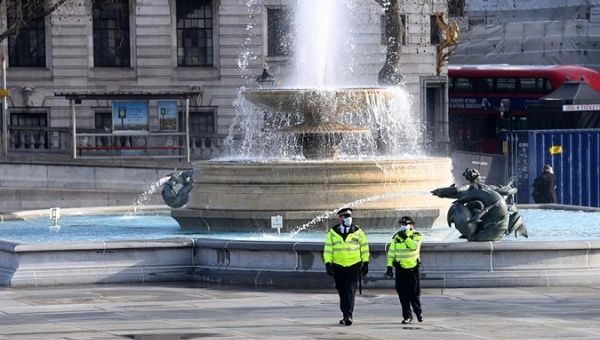 Police patrol Trafalgar square during third national lockdown, London, Britain, Jan. 23, 2021.