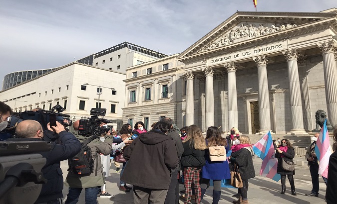 Trans activists protest in front of Congress, Madrid, Spain, Feb. 18, 2021.