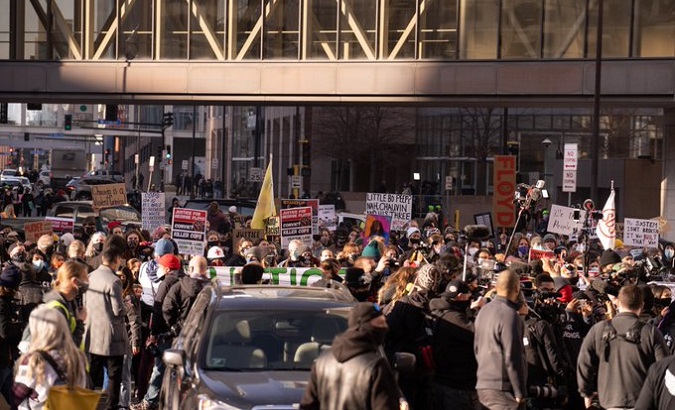 Citizens gather outside the building where Derek Chauvin's trial will take place, Minneapolis, Minnesota, U.S., March 8, 2021.