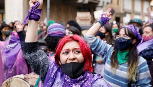 A woman shouts slogans during a march called on the occasion of the International Day for the Elimination of Violence against Women, in the streets of Bogota, Colombia.  