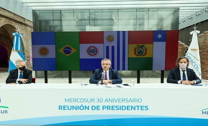 The Argentine delegation, headed by Alberto Fernandez (C) during the MERCOSUR virtual summit in Buenos Aires, Argentina, March 26, 2021.