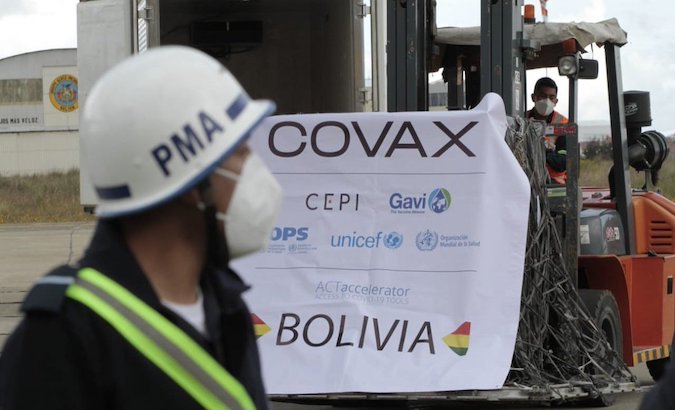 Airport workers unload vaccines in La Paz, Bolivia, April 7, 2021.