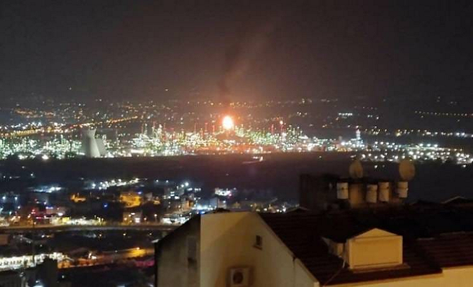 Flames and smoke coming from Bazan Refinery during the fire, Haifa, Israel, Apr. 30, 2021.