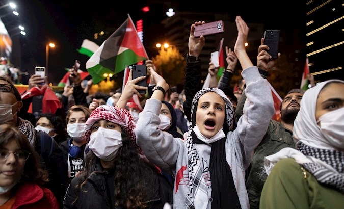 People protest in front of Israel Consulate, Istanbul, Turkey, May 10, 2021.