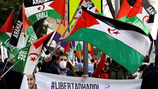 People calling for the release of Haddi, a Saharawi political prisoner on hunger strike, Madrid, Spain, Feb. 28, 2021.