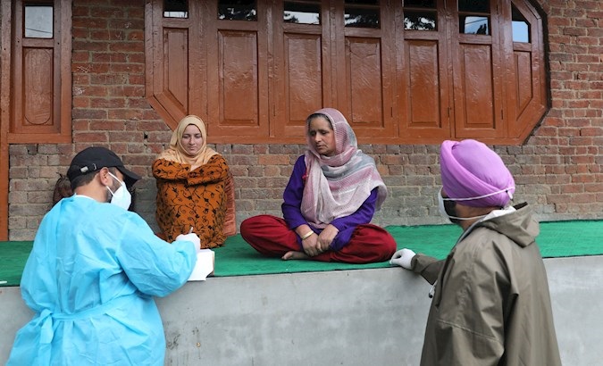 Health workers in Kashmir's Budgam district, India, May 20, 2021.