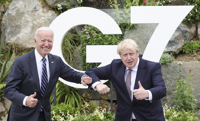 British Prime Minister Boris Johnson (R) and U.S. President Joe Biden, Cornwall, Britain, June 10, 2021.