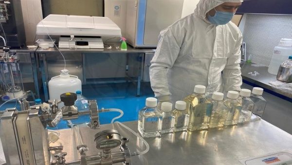 A scientist works at Actoverco's facility in Karaj, Iran, Jun. 26, 2021.