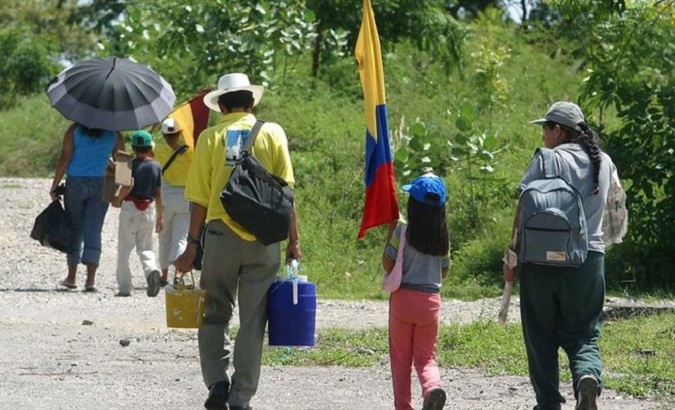 Families leave their homes to head for the cities, Colombia, June 2021.