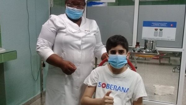 Teen completes his COVID-19 vaccination scheme, Havana, Cuba, Aug. 9, 2021.