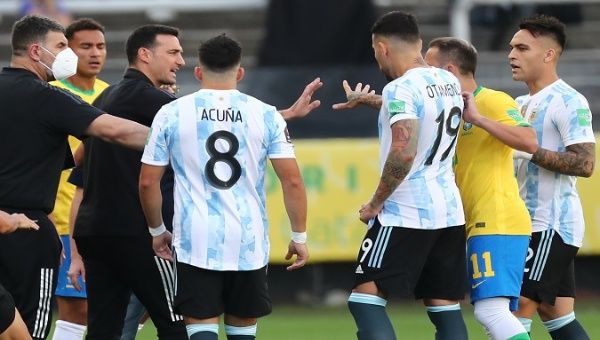 Brazilian health authorities intervene in a match between football teams from Brazil and Argentina, Sao Paolo, Brazil, Sep. 5, 2021.