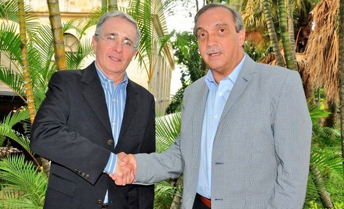 Ex-President Alvaro Uribe (L) and Ex-Senator Luis Ramos.