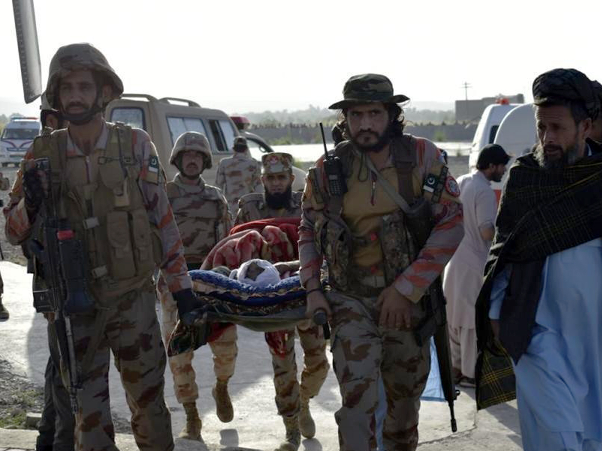 Photo released by Pakistan's National Disaster Management Authority (NDMA) on Oct. 7, 2021 shows an injured earthquake survivor being transported in southwest Pakistan's Harnai.