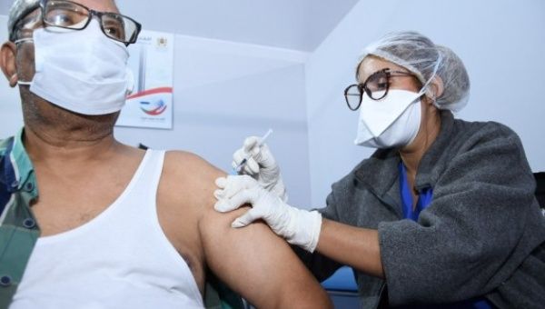  A man receives the 3rd dose of the COVID-19 vaccine in Sale, Morocco, on Oct. 9, 2021.