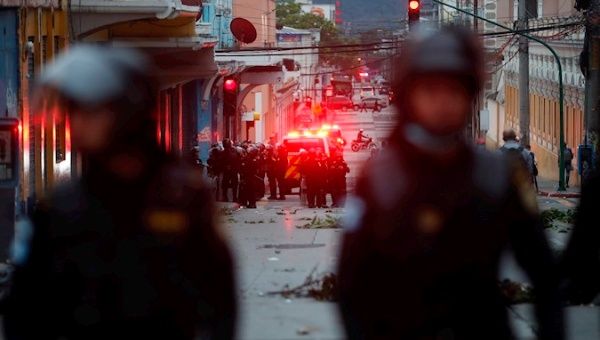 Authorities are present at the Congress headquarters during a protest by retired military personnel in Guatemala City.