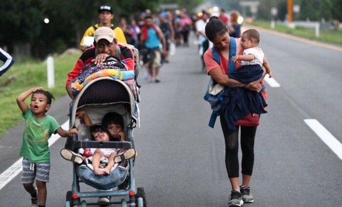 Migrant children travel with their parents, Mexico, 2021.