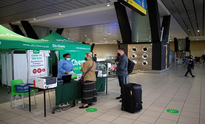 Passengers get tested for Covid-19 at OR Thambo International Airport, Johannesburg, South Africa, Nov. 27, 2021.