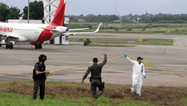 Investigators from the Army and the Prosecutor's Office at Daza Airport, Cucuta, Colombia, Dec. 14, 2021.