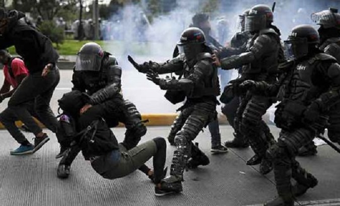 Members of the police riot squad attack a citizen, Colombia, 2021.