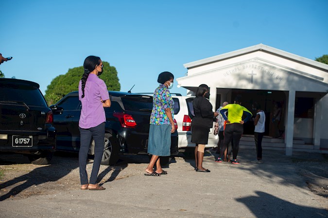 People wait in line today to vote at the Bethel Baptist Church in Bridgetown (Barbados)