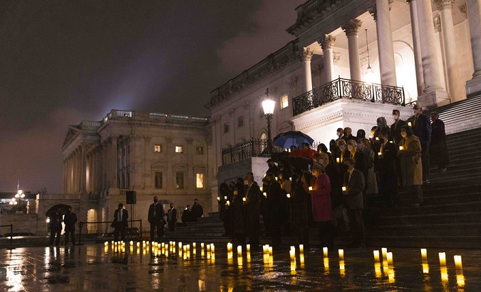 Lawmakers participate in a moment of silence at the Capitol, Washington, D.C., U.S. Feb. 7, 2022