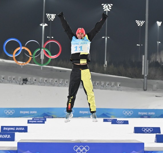 Vinzenz Geiger of Germany celebrates after Nordic combined individual Gundersen normal hill/10km, cross-country at the National Cross-Country Skiing Center in Zhangjiakou, north China's Hebei Province on Feb. 9, 2022.