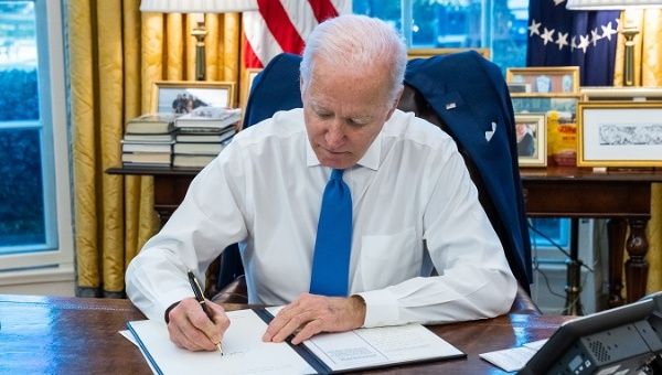 President Joe Biden signing an Executive Order, Washington DC, US., Feb. 21, 2022.