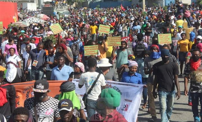 Citizens take part in a demonstration to demand wage increases, Haiti, Feb. 23, 2022.