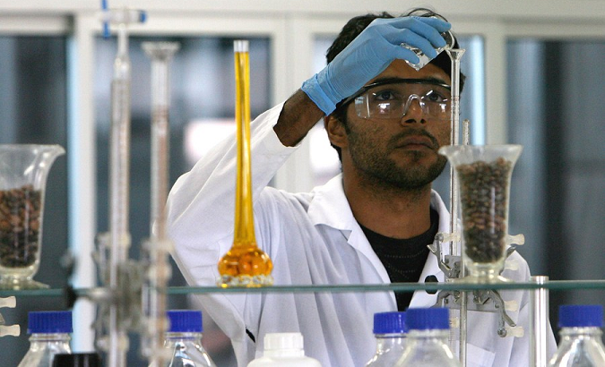 A technician works in a lab at the Brasil Ecodiesel factory in Iraguara, Brazil.
