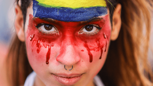 A citizen during a protest against the assassination of social leaders in Colombia.