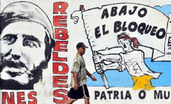A billboard demanding “Down with the blockade”, Cuba, 2022.