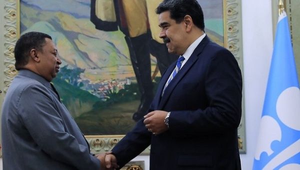 OPEC Secretary General Mohammed Barkindo congratulates the Head of State Nicolas Maduro 
