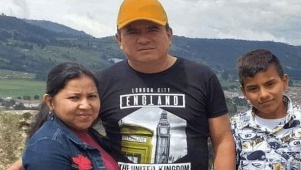 Social leader Elizabeth Medoza (L) with her husband and son, Colombia. 