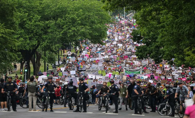 Citizens take part in a demonstration to reject the Supreme Court's intention to overturn the constitutional right to abortion, U.S., May 2022.
