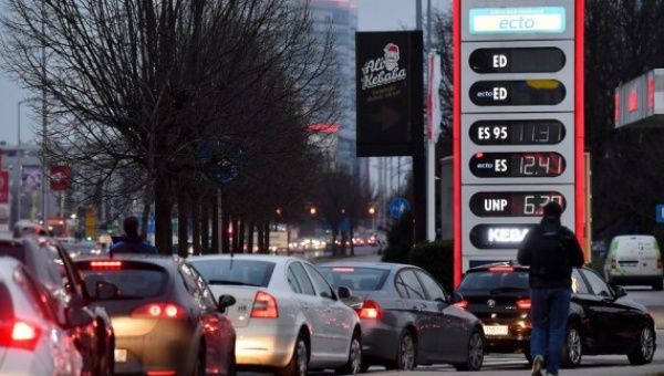Vehicles line up to enter a gas station as fuel prices will rise the next day in Zagreb, Croatia, on March 7, 2022.