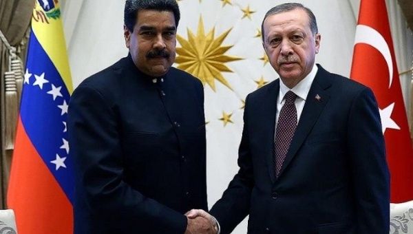 Venezuela's President Nicolas Maduro (L) and Turkey's President Recep Tayyip Erdogan (R).