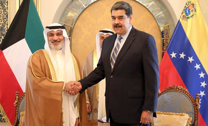 Venezuelan President Nicolas Maduro (R) and Haitham al-Ghais (L) in Kuwait, June 14, 2022.