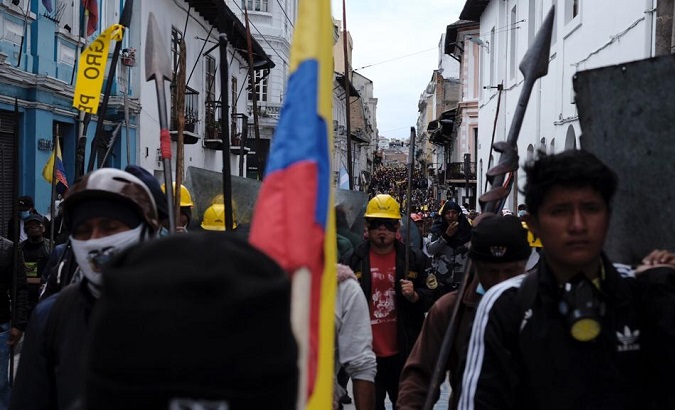 Thousands of people march through downtown Quito, June 28, 2022.