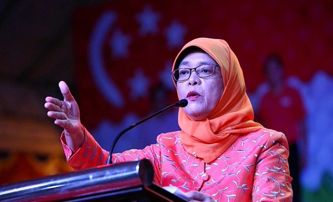 Singapore's President announced Monday that she tested positive for Covid. July. 4, 2022.