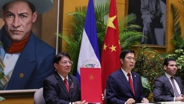 Nicaraguan and Chinese diplomats sign trade agreements, Managua, Nicaragua, July 11, 2022.