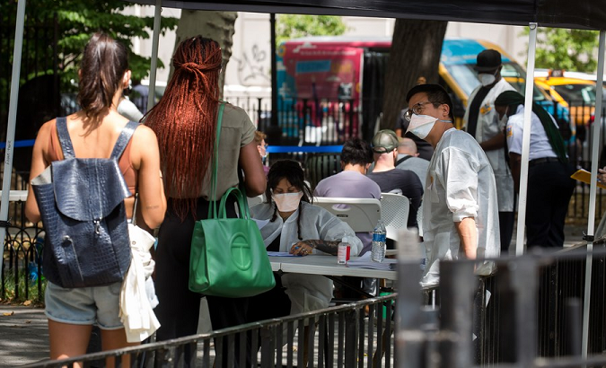 People wait to be vaccinated at a monkeypox vaccination site, New York, U.S., July 14, 2022.