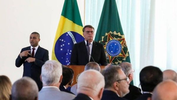 President Jair Bolsonaro (C) at a meeting with ambassadors, Brasilia, Brazil, July 18, 2022.