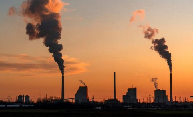 Factories emitting greenhouse gases.
