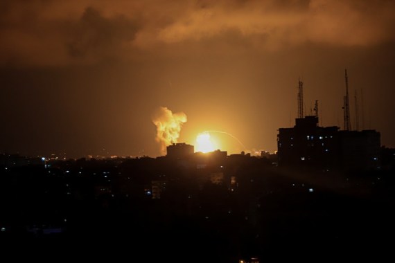 Smoke and fire are seen rising during an Israel airstrike in Gaza City, on Aug. 5, 2022.