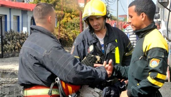 Venezuelan and Mexican aid workers arrive to fight the fire, Matanzas, Cuba, Aug. 9, 2022.