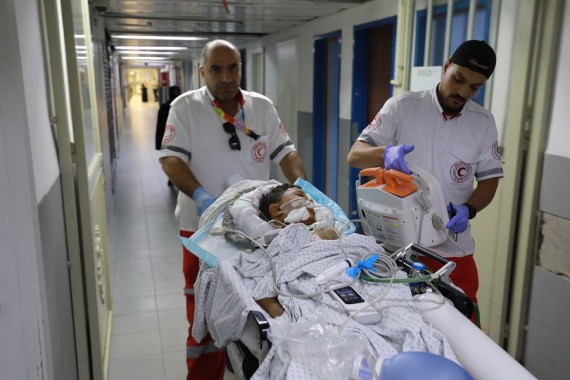 Medical workers transfer a child from Gaza, who was injured during the recent Israeli airstrikes, to a hospital in East Jerusalem, on Aug. 10, 2022.