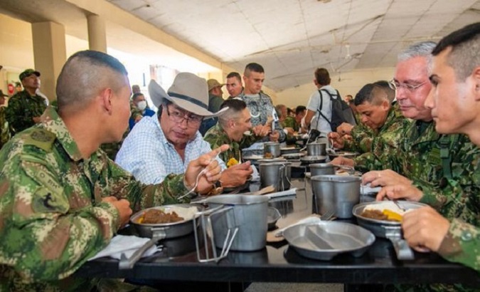 President Gustavo Petro (R) during a lunch with Colombian troops, Aug. 2022.