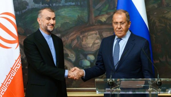 Russian Foreign Minister Sergei Lavrov (R) shakes hands with Iranian Foreign Minister Hossein Amir-Abdollahian in Moscow on Aug. 31, 2022.