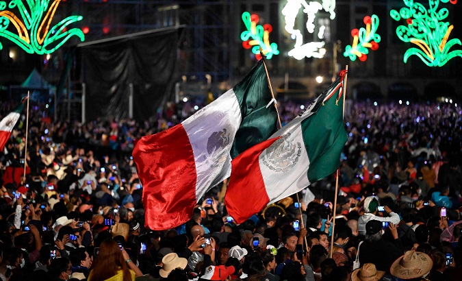 People in the Zocalo Square waiting for the "Cry of Dolores", Mexico City, Mexico, Sept. 15, 2022.