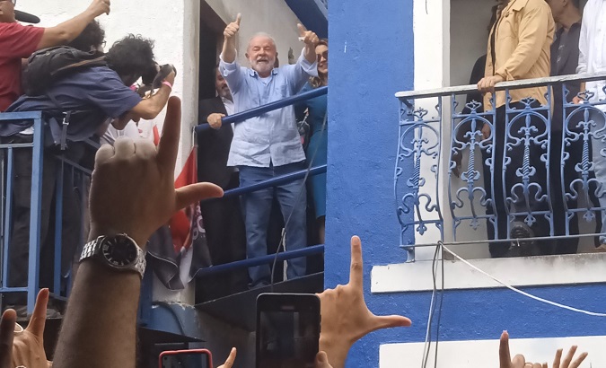 Lula da Silva seen from the crowd waiting for him in Madureira, Brazil, Sept. 25, 2022.